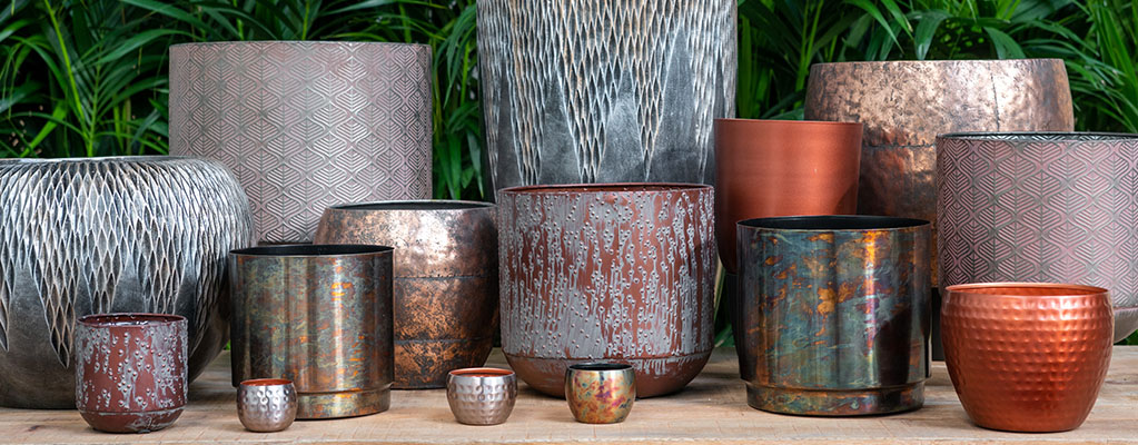 Bronzen en koperen bloempotten